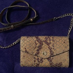 Michael Kors snakeskin wallet on a chain